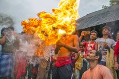 fireball and devotee during gajan festival